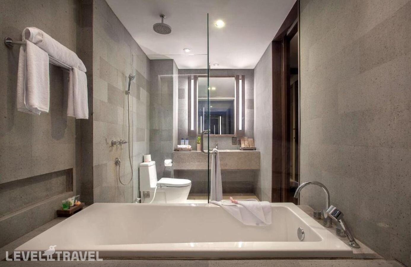 фотографии номера Делюкс (две односпальные кровати) отеля Wyndham Tamansari Jivva Resort Bali в Индонезия(Семарапура) - фото №3