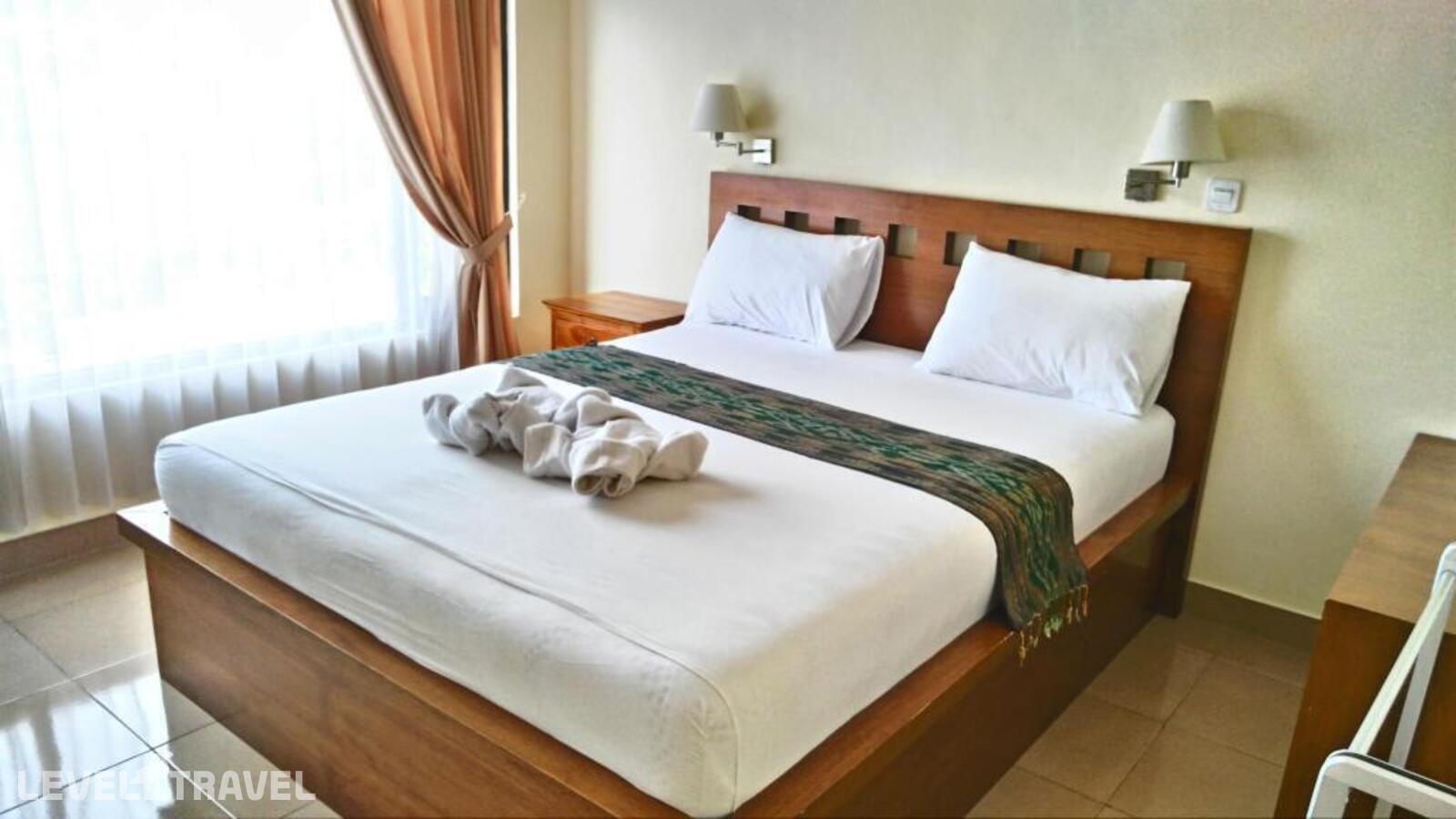 фотографии номера Делюкс отеля Nyoman Badri Homestay в Индонезия(Убуд) - фото №2