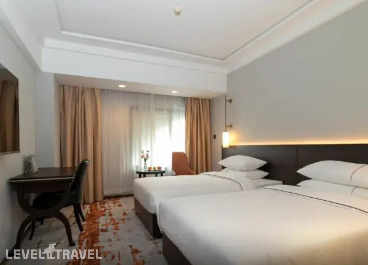 фотографии номера Стандартный (две односпальные кровати) отеля Guangdong Victory Hotel в Китай(Гуанчжоу) - фото №2