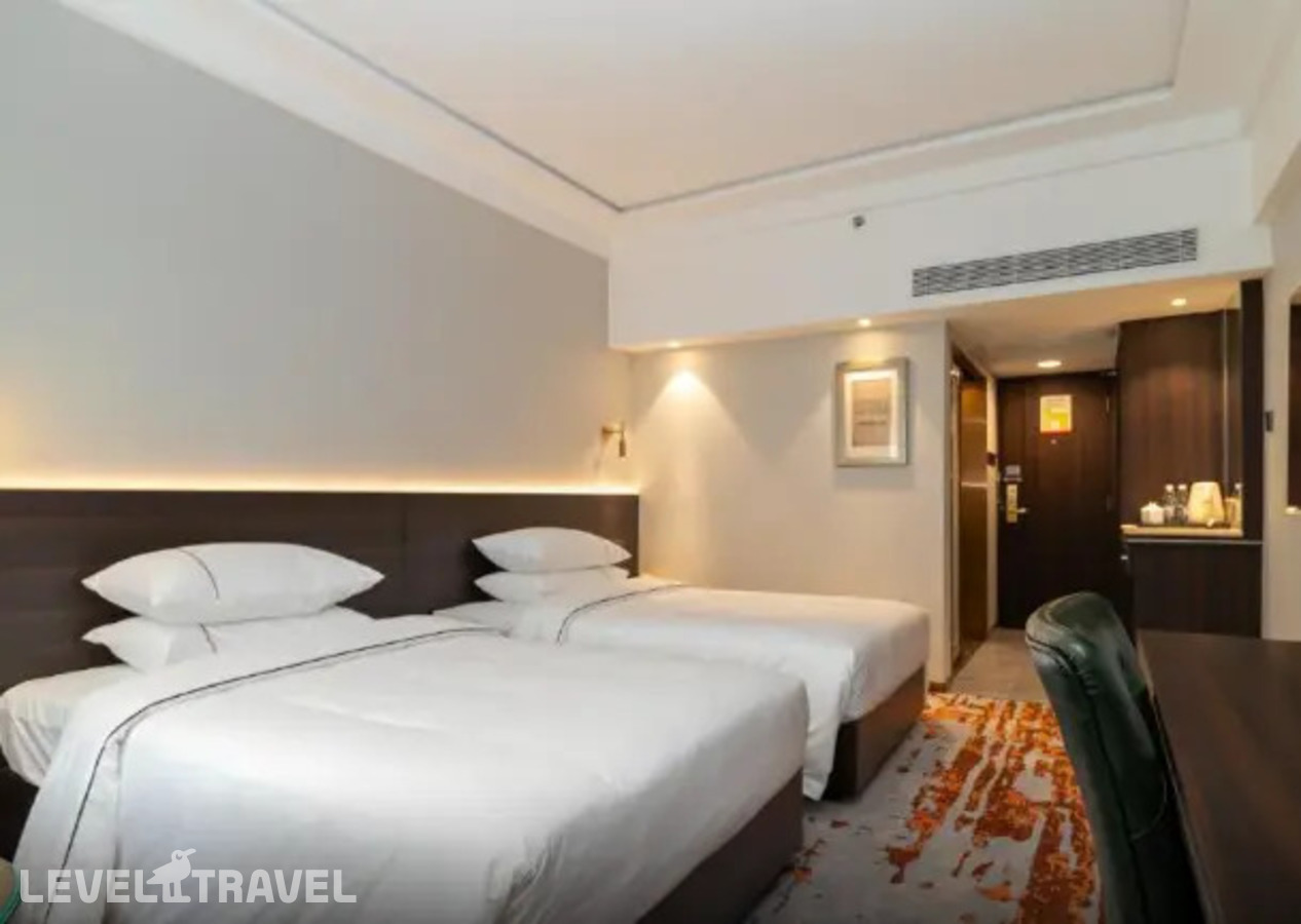 фотографии номера Стандартный (две односпальные кровати) отеля Guangdong Victory Hotel в Китай(Гуанчжоу) - фото №1