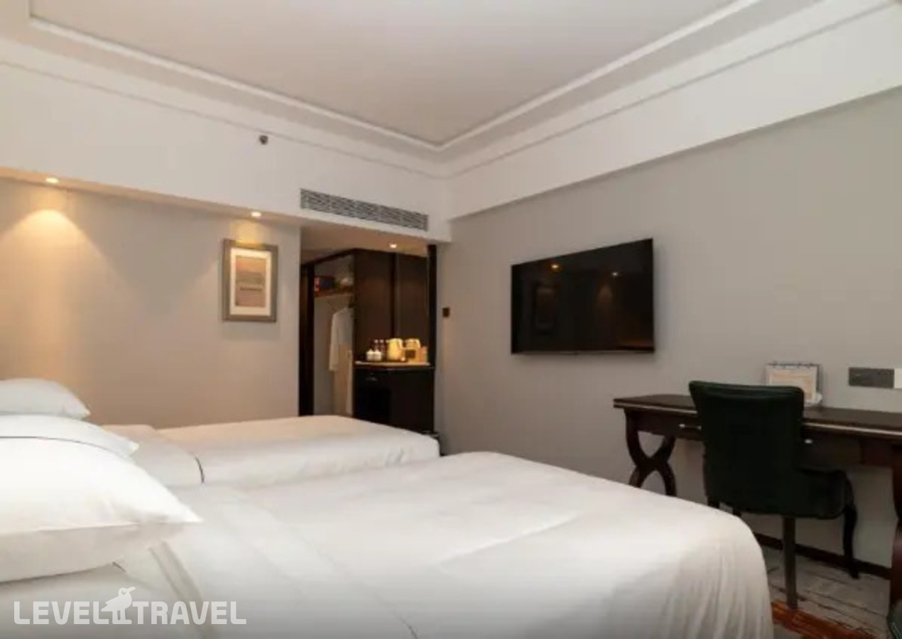 фотографии номера Стандартный (две односпальные кровати) отеля Guangdong Victory Hotel в Китай(Гуанчжоу) - фото №4
