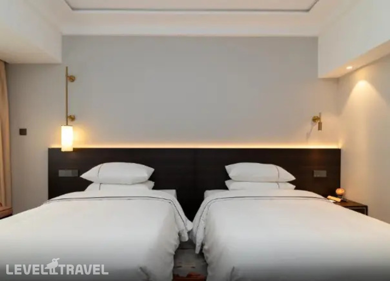 фотографии номера Стандартный (две односпальные кровати) отеля Guangdong Victory Hotel в Китай(Гуанчжоу) - фото №3