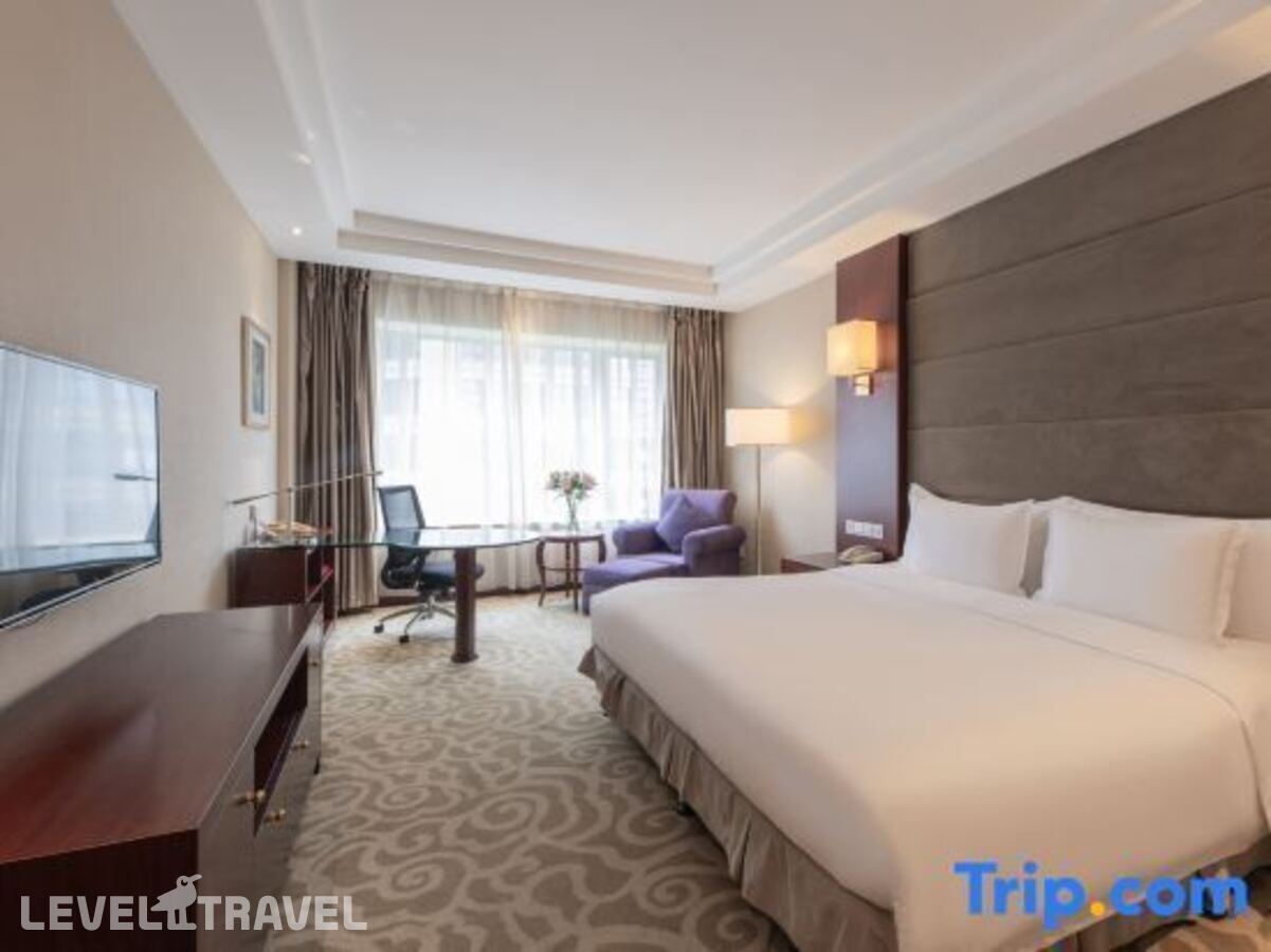 фотографии номера Двухместный номер Upgraded Standard двуспальная кровать отеля Crowne Plaza Hotel Shanghai, An Ihg Hotel в Китай(Шанхай) - фото №1