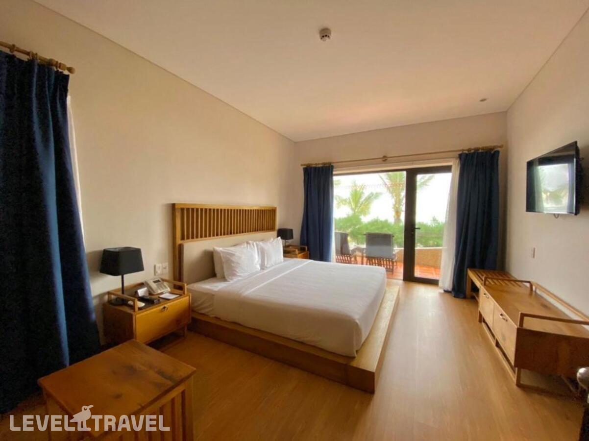 фотографии номера Семейное бунгало с видом на сад отеля Sandy Beach Non Nuoc Resort в Вьетнам(Дананг) - фото №1