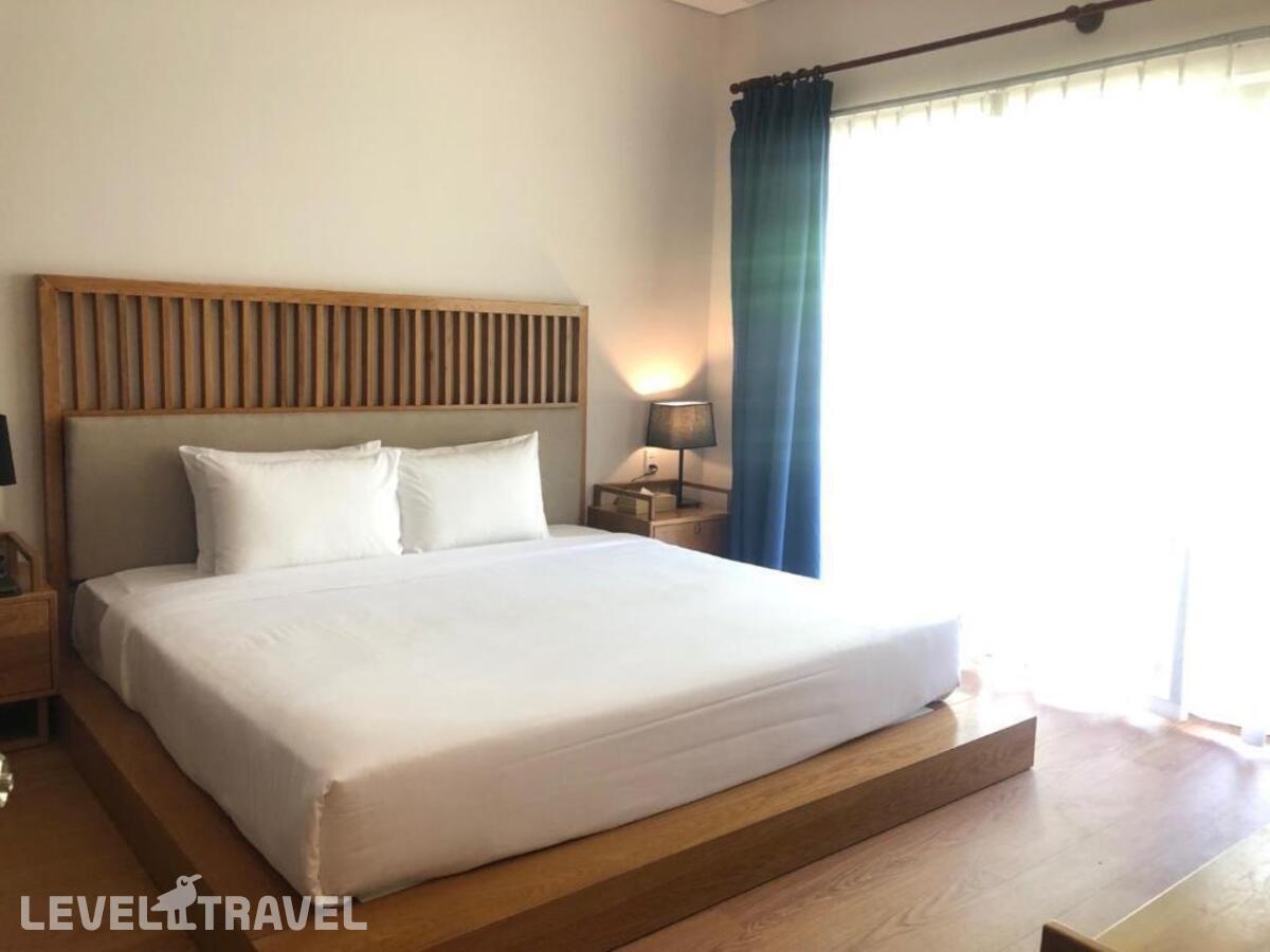 фотографии номера Семейное бунгало с видом на океан отеля Sandy Beach Non Nuoc Resort в Вьетнам(Дананг) - фото №1