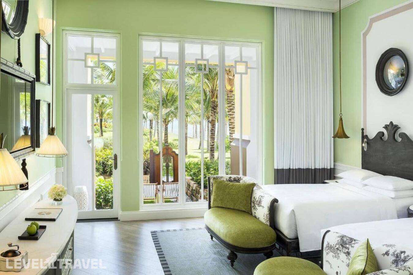 фотографии номера Стандартный (две двуспальные кровати) отеля JW Marriott Phu Quoc Emerald Bay Resort & Spa в Вьетнам(Фукуок) - фото №3
