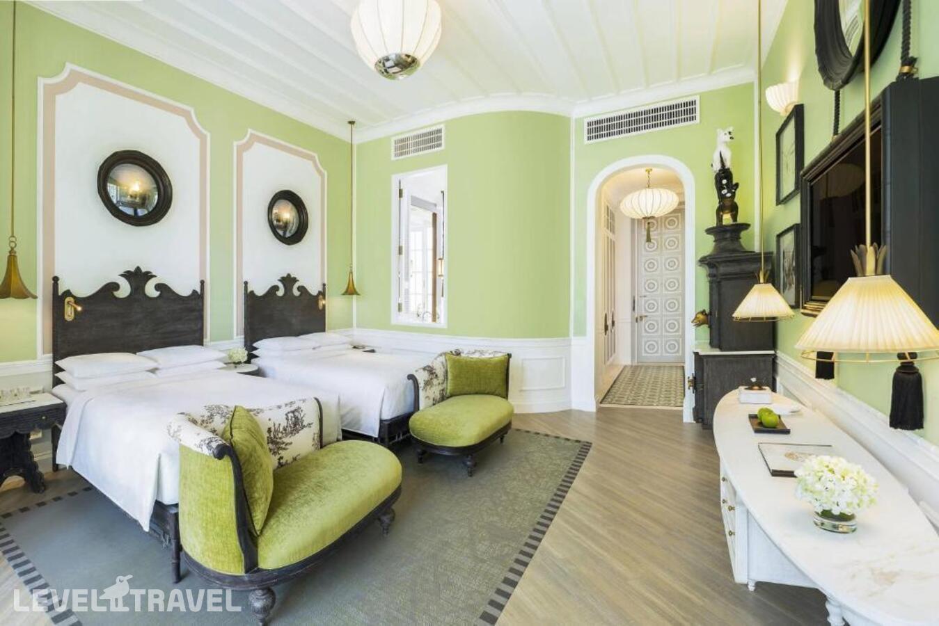 фотографии номера Стандартный (две двуспальные кровати) отеля JW Marriott Phu Quoc Emerald Bay Resort & Spa в Вьетнам(Фукуок) - фото №1