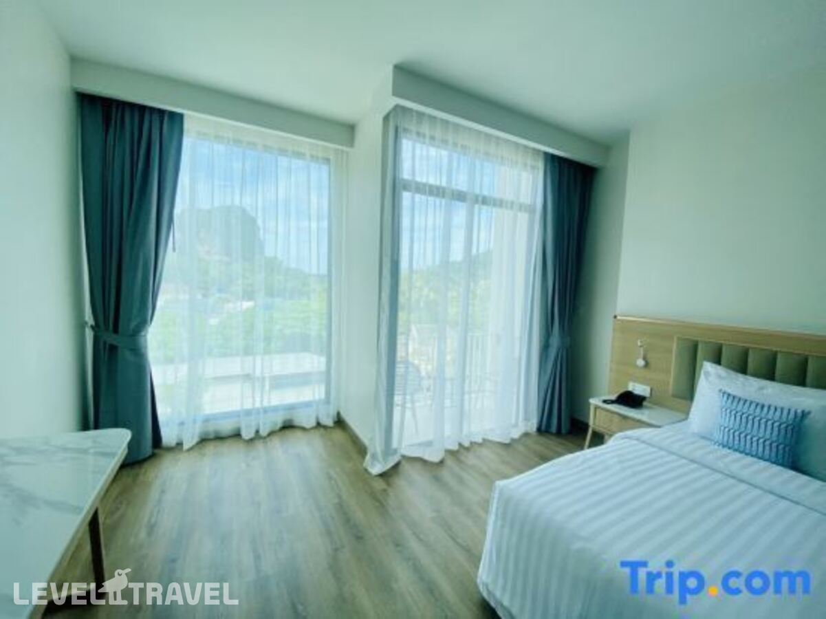 фотографии номера Делюкс с видом на бассейн отеля Infinity Aonang Krabi Hotel в Таиланд(Ао Нанг) - фото №2