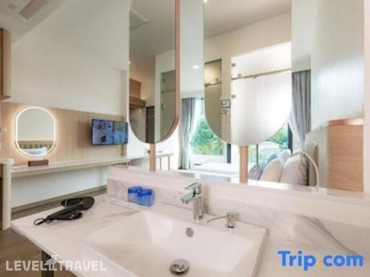 фотографии номера Делюкс с видом на бассейн отеля Infinity Aonang Krabi Hotel в Таиланд(Ао Нанг) - фото №9