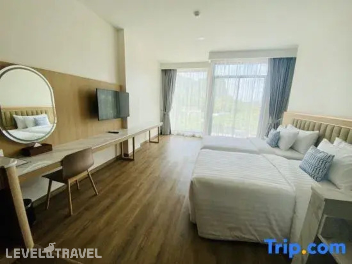 фотографии номера Делюкс с видом на бассейн отеля Infinity Aonang Krabi Hotel в Таиланд(Ао Нанг) - фото №1