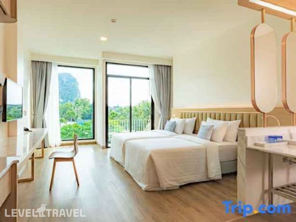 фотографии номера Делюкс с видом на бассейн отеля Infinity Aonang Krabi Hotel в Таиланд(Ао Нанг) - фото №6