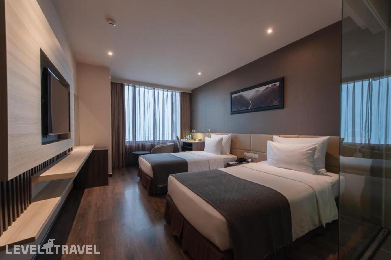 фотографии номера Стандартный (две односпальные кровати) отеля Alana Beach Hotel Nha Trang в Вьетнам(Нячанг) - фото №3