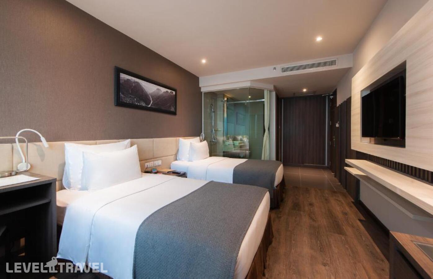 фотографии номера Стандартный (две односпальные кровати) отеля Alana Beach Hotel Nha Trang в Вьетнам(Нячанг) - фото №1