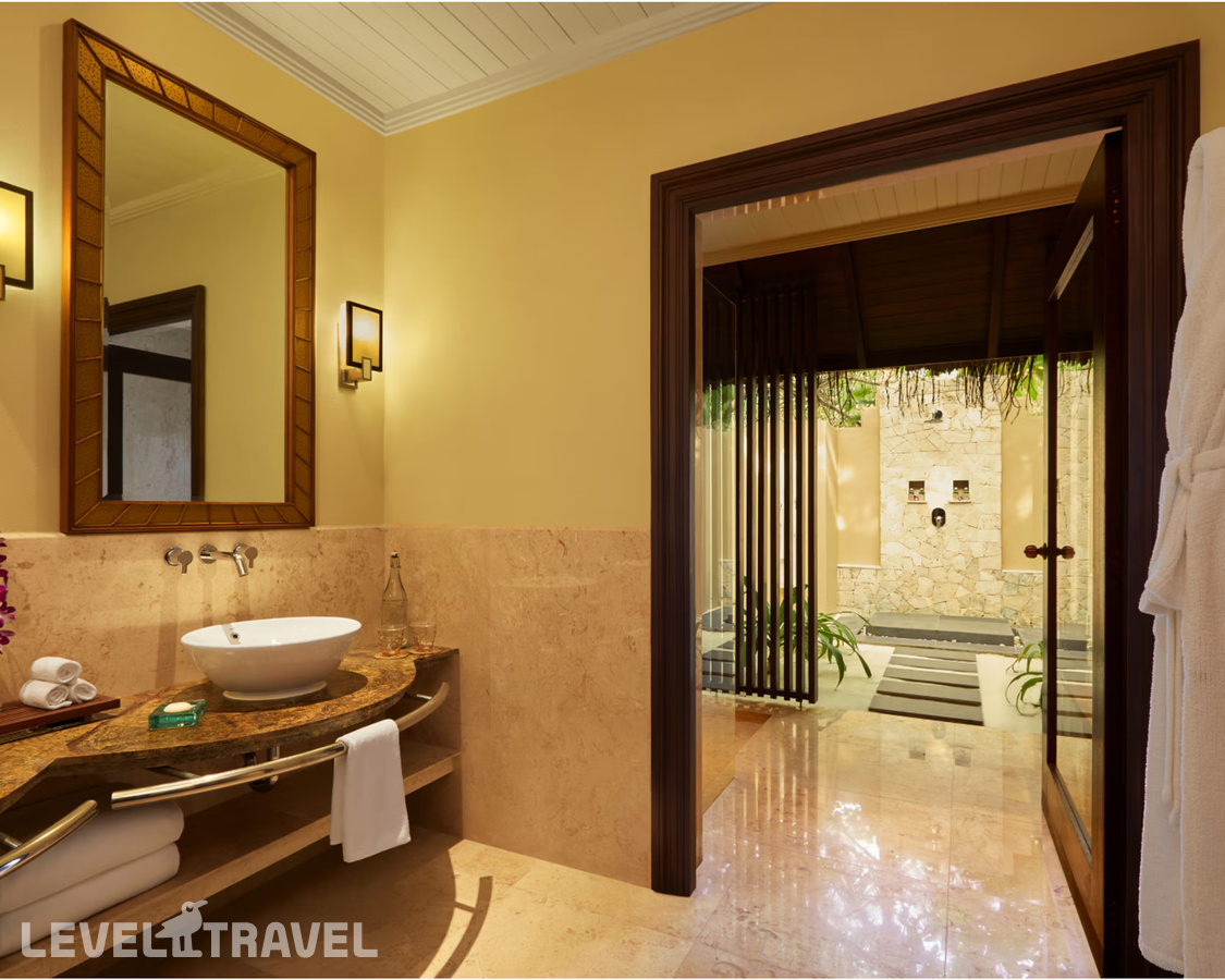 фотографии номера Пляжная вилла Sunset с бассейном отеля Taj Exotica Resort & Spa в Мальдивы(Южный Мале Атолл) - фото №3