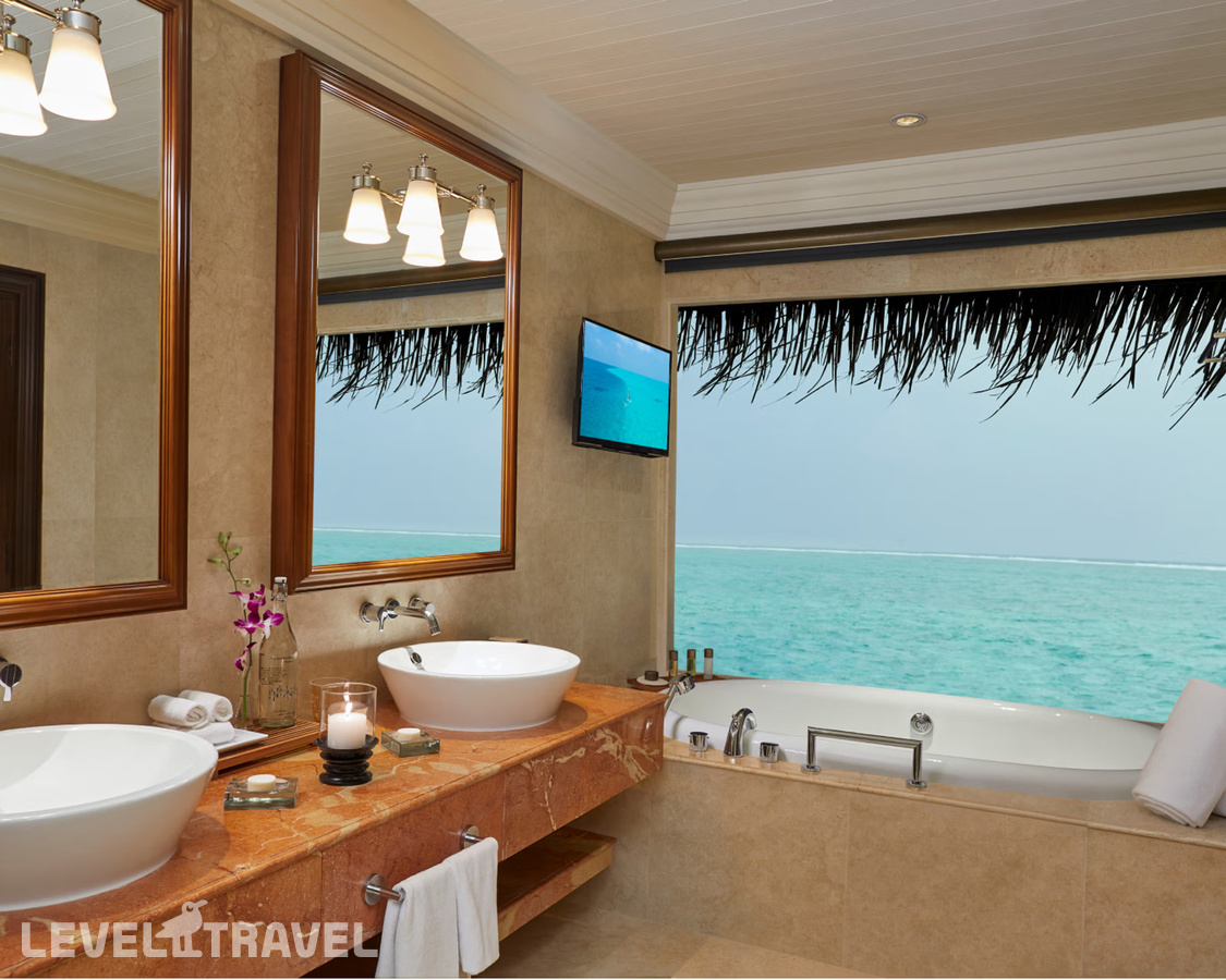 фотографии номера Люкс на воде Sunrise отеля Taj Exotica Resort & Spa в Мальдивы(Южный Мале Атолл) - фото №3