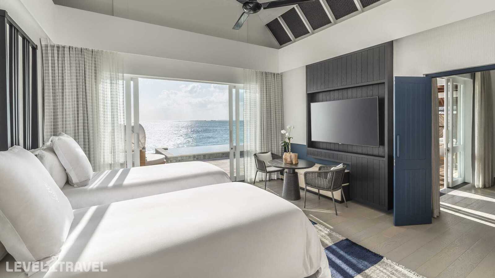 фотографии номера Люкс на воде Sunset (2 спальни) отеля Four Seasons Resort Landaa Giravaru в Мальдивы(Баа Атолл) - фото №2