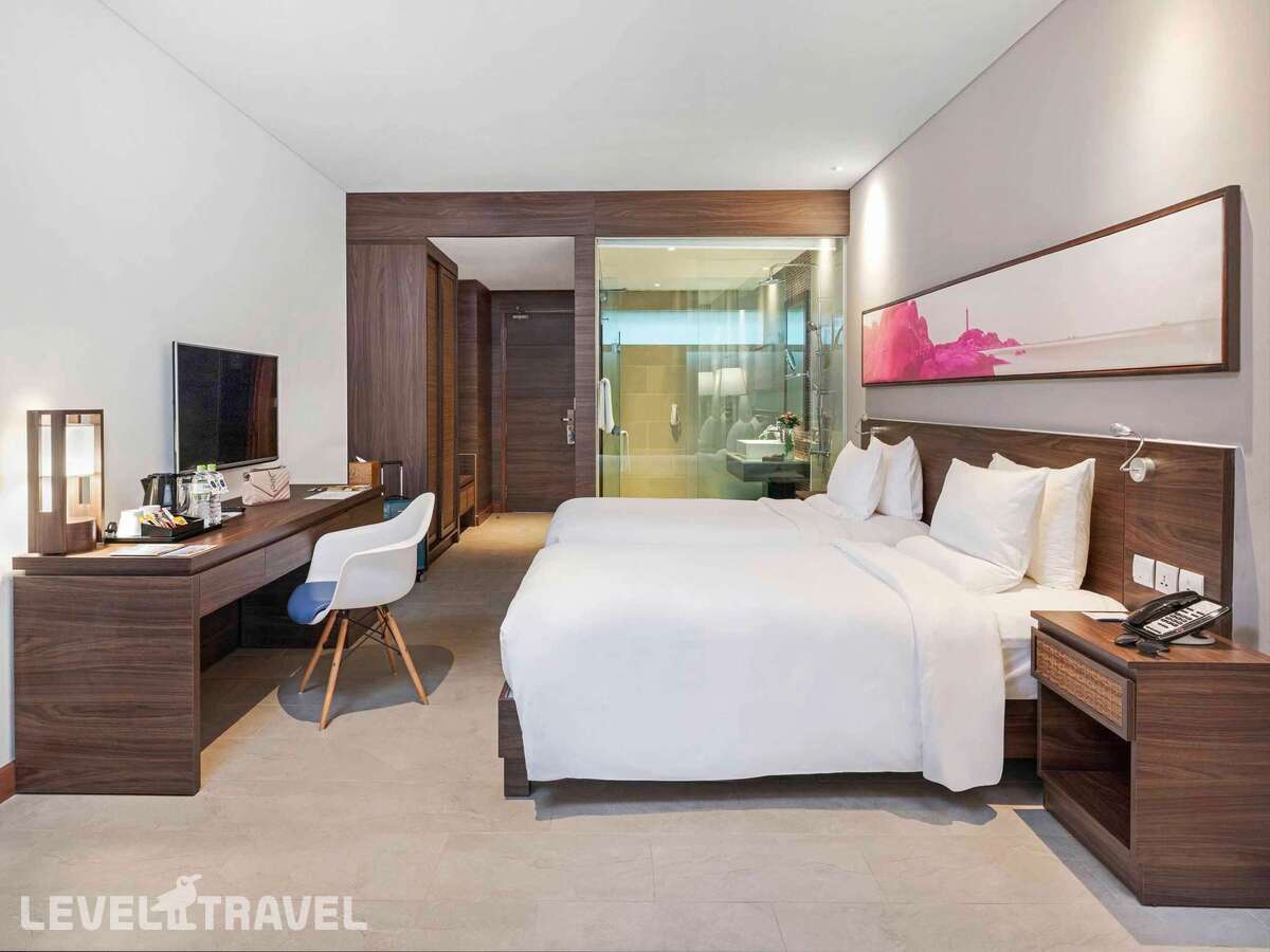 фотографии номера Улучшенный с видом на бассейн отеля Novotel Phu Quoc Resort в Вьетнам(Фукуок) - фото №2