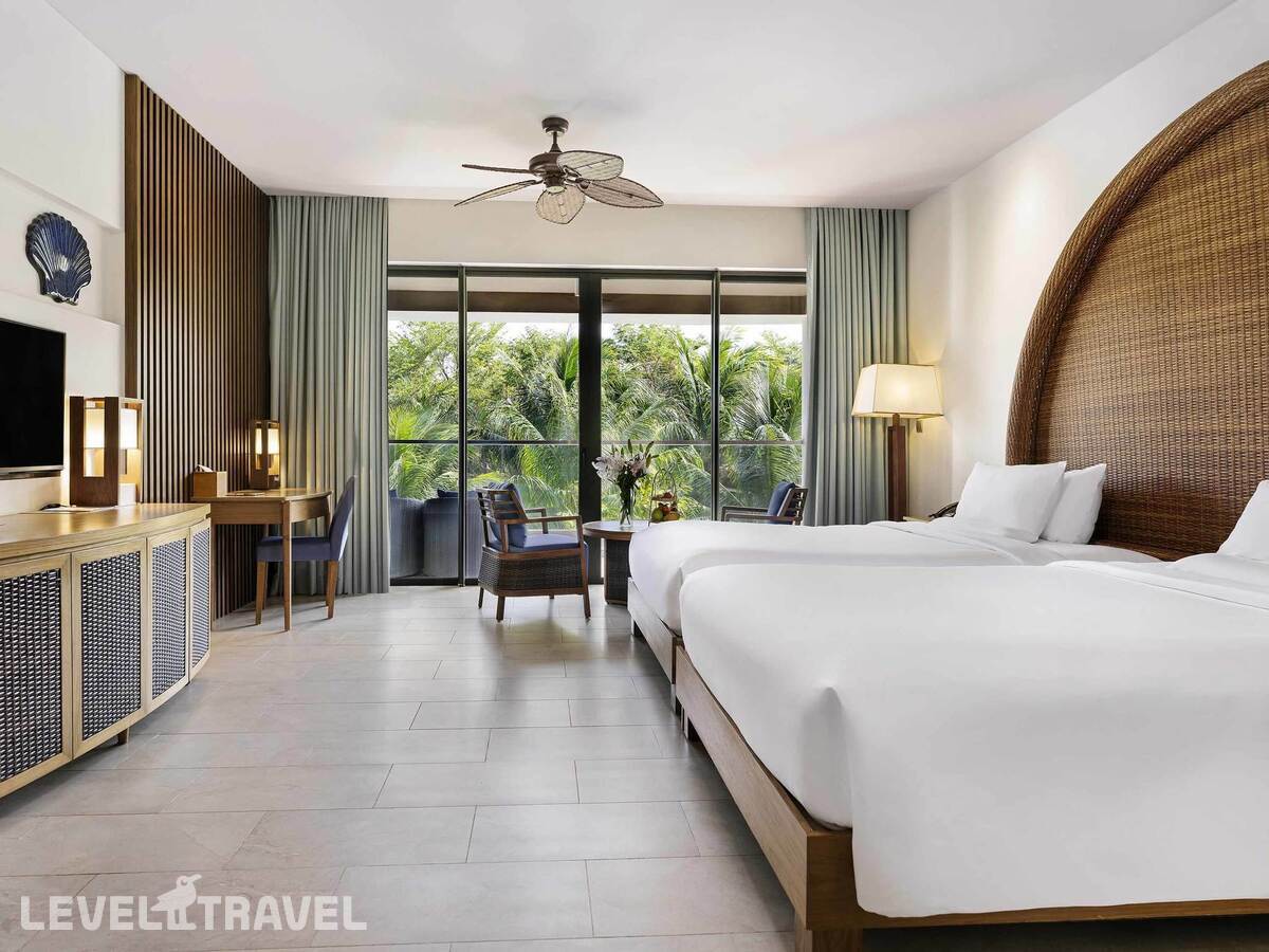 фотографии номера Делюкс (две односпальные кровати) отеля Novotel Phu Quoc Resort в Вьетнам(Фукуок) - фото №7