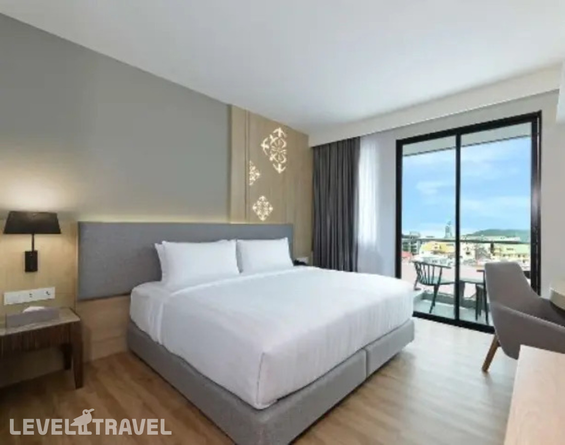 фотографии номера Делюкс с видом на город отеля Hotel Amber Pattaya в Таиланд(Центральная Паттайя) - фото №4