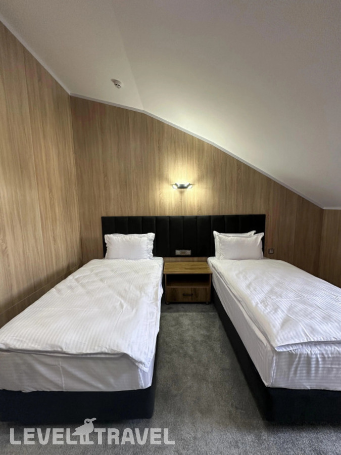 фотографии номера Экономичный (две односпальные кровати) отеля Wellfort Hotel в Узбекистан(Самарканд) - фото №3