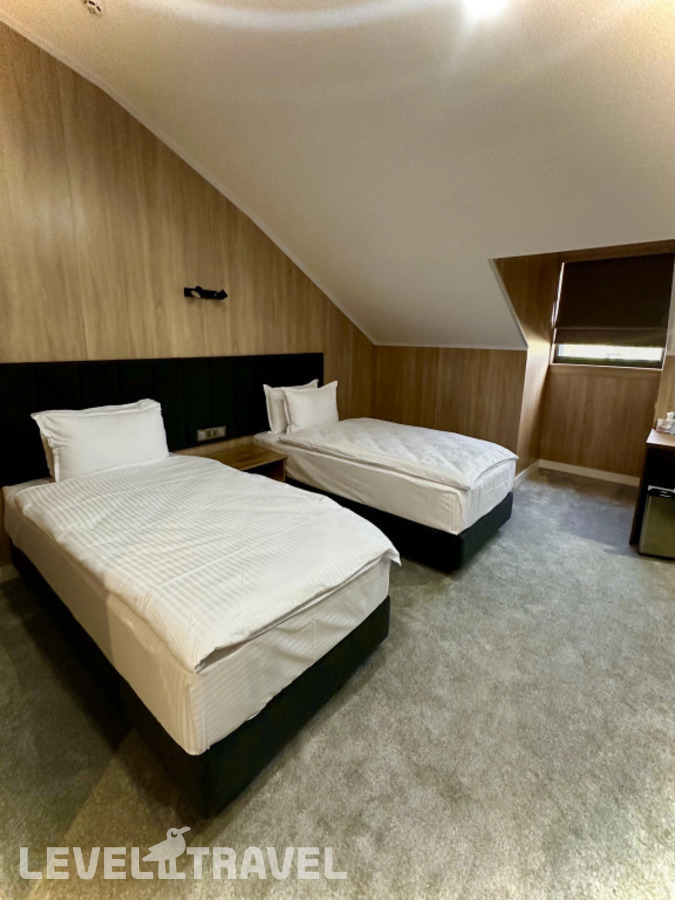 фотографии номера Экономичный (две односпальные кровати) отеля Wellfort Hotel в Узбекистан(Самарканд) - фото №2