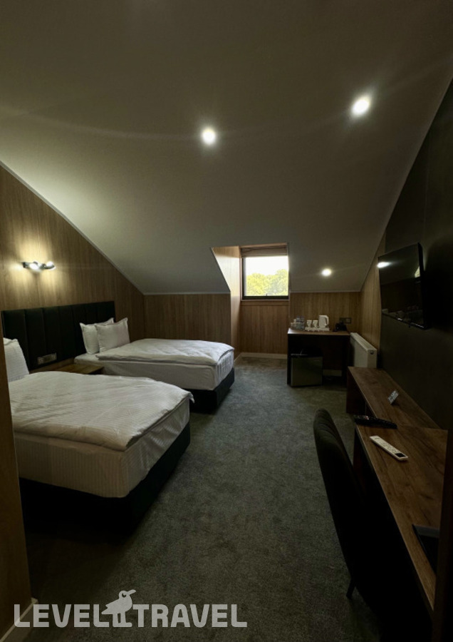 фотографии номера Экономичный (две односпальные кровати) отеля Wellfort Hotel в Узбекистан(Самарканд) - фото №4