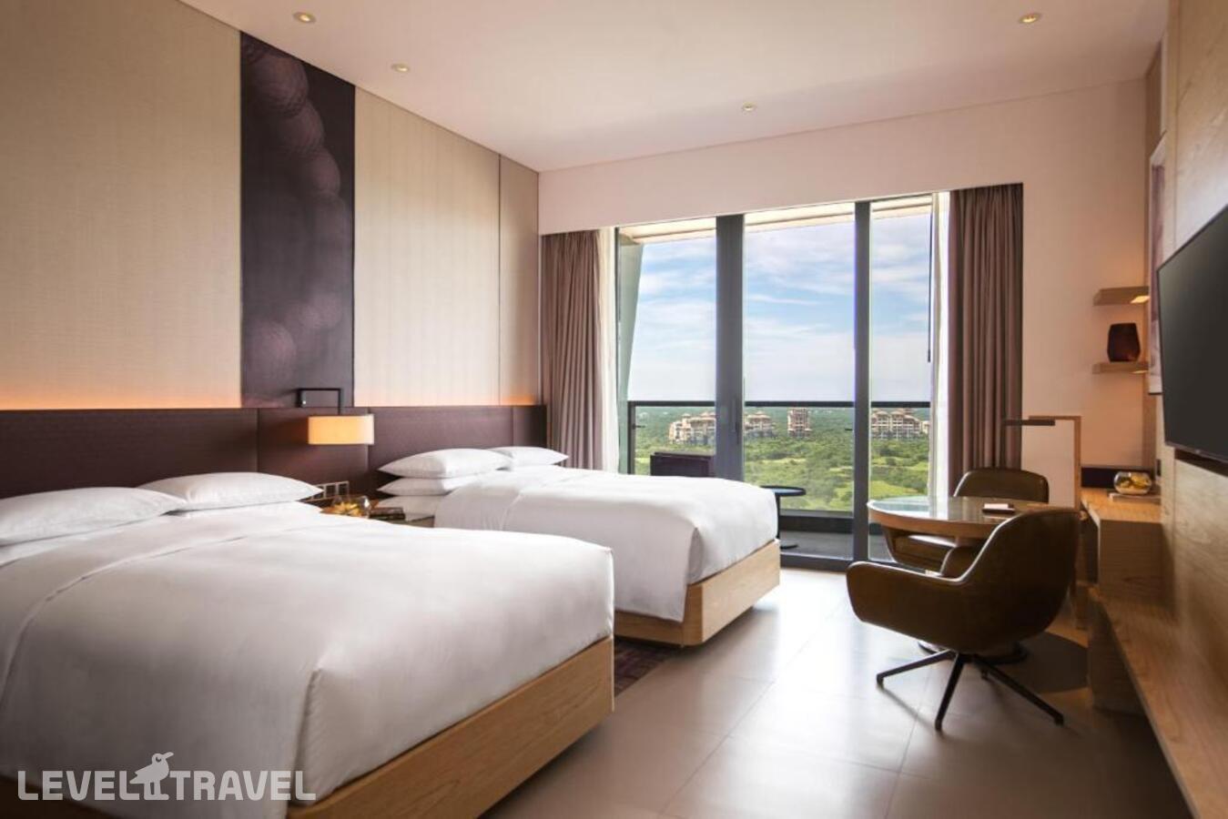 фотографии номера Улучшенный (две двуспальные кровати) отеля Renaissance Haikou Hotel в Китай(Хайкоу) - фото №3