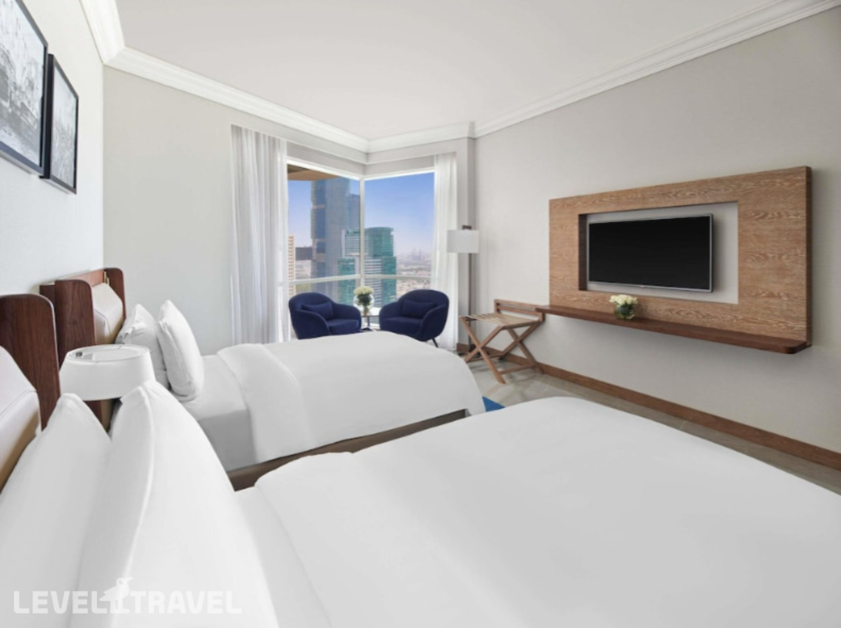 фотографии номера Стандартный (две односпальные кровати) отеля Fairmont Dubai в ОАЭ(Дубай Джумейра) - фото №1