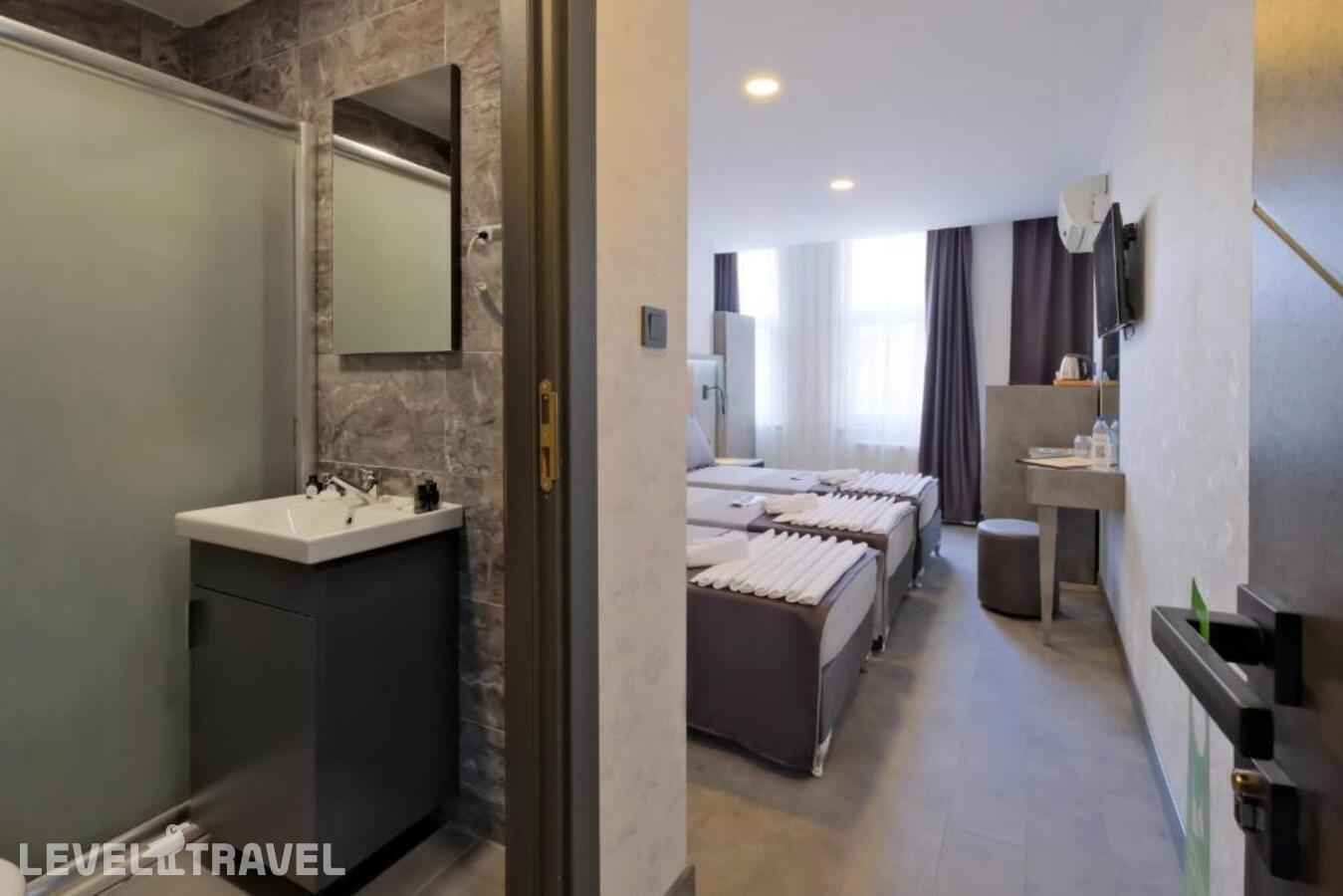 фотографии номера Трехместный Комфорт отеля The Queen Hotel в Турция(Фатих) - фото №8