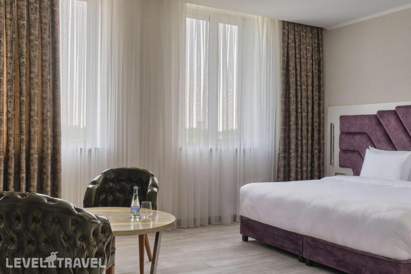 фотографии номера Премиум (две односпальные кровати) отеля Panarams Individual By Radisson в Узбекистан(Ташкент) - фото №1