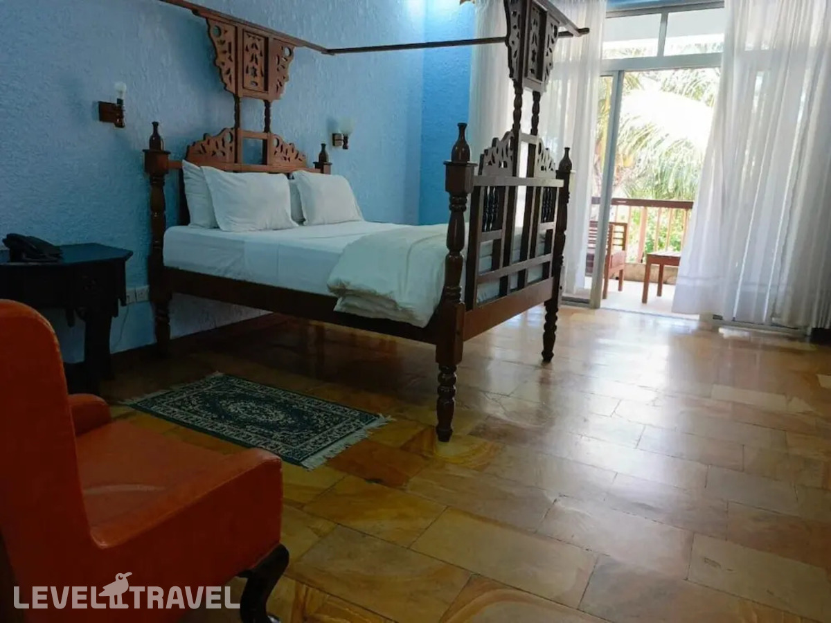 фотографии номера Стандартный с балконом и видом на море отеля Serene Beach Resort в Танзания(Дар-эс-Салам) - фото №1