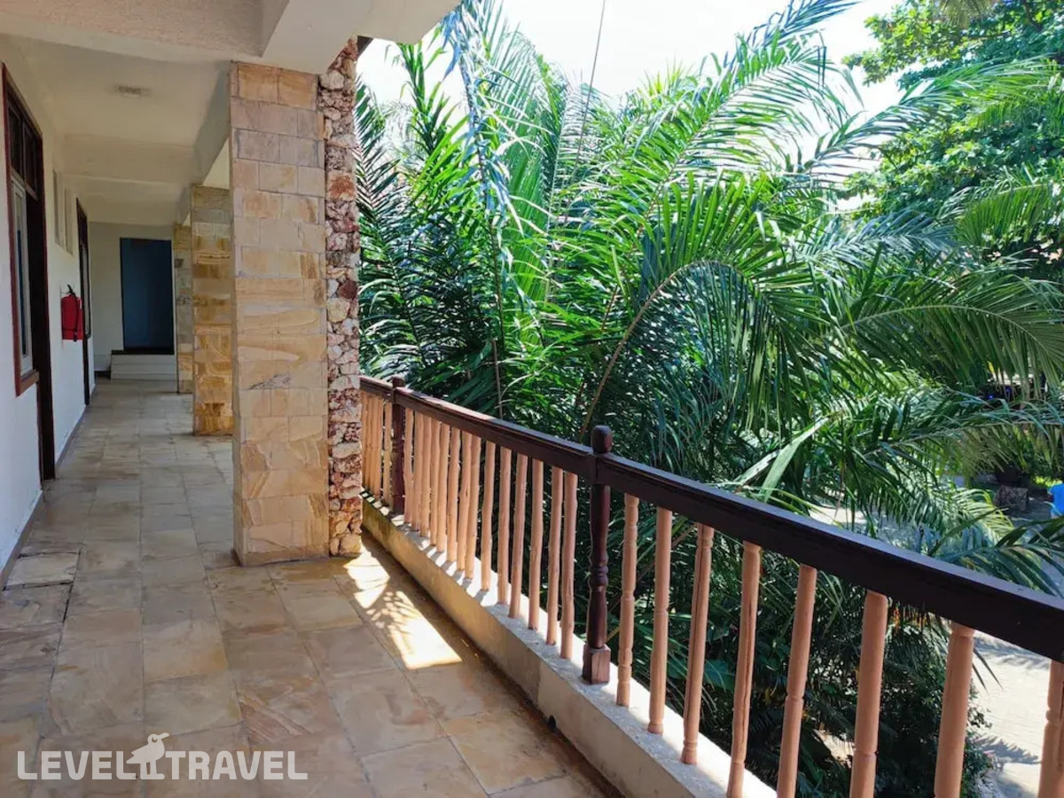 фотографии номера Стандартный с балконом и видом на море отеля Serene Beach Resort в Танзания(Дар-эс-Салам) - фото №10