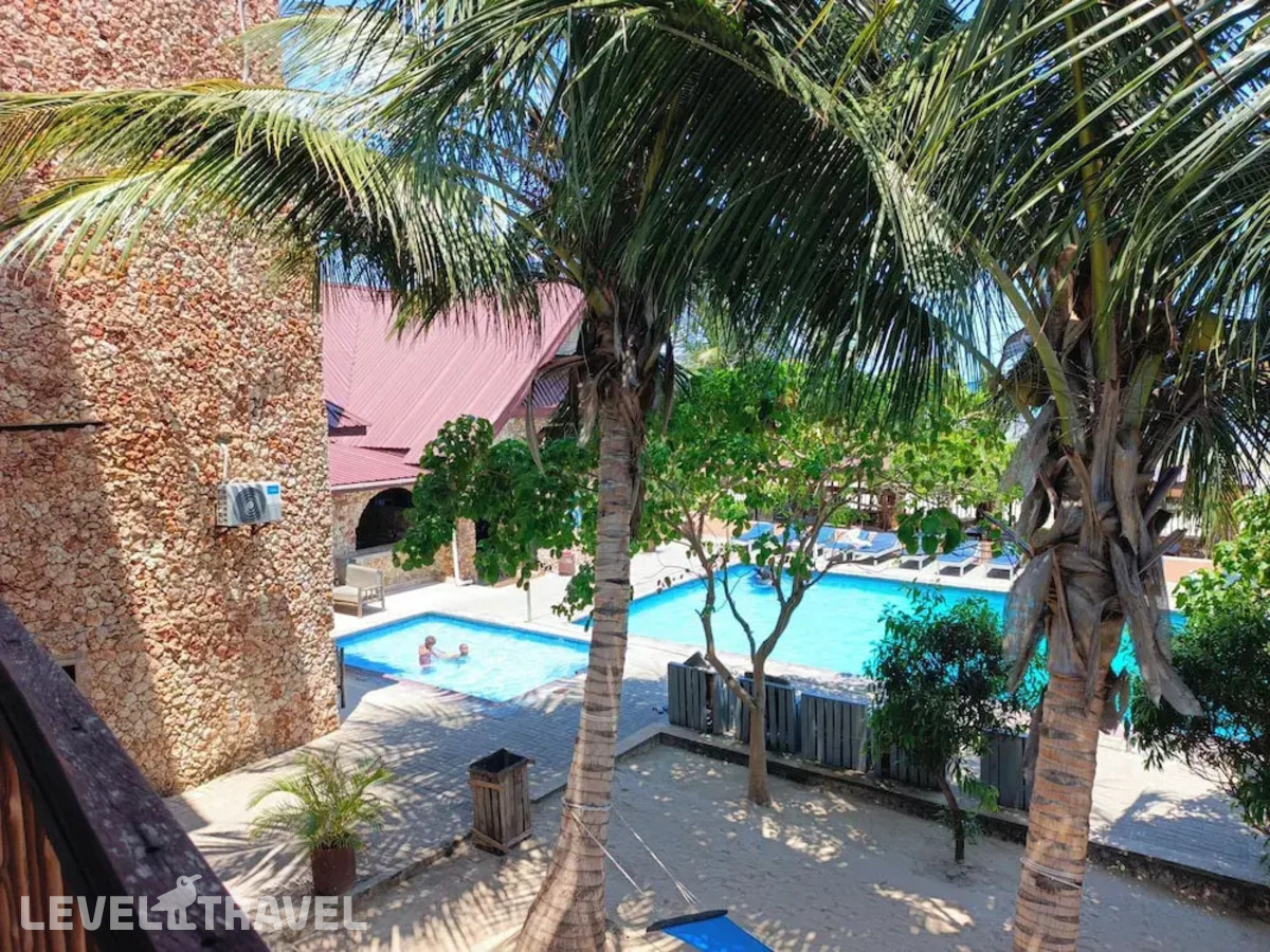 фотографии номера Стандартный с балконом и видом на море отеля Serene Beach Resort в Танзания(Дар-эс-Салам) - фото №8