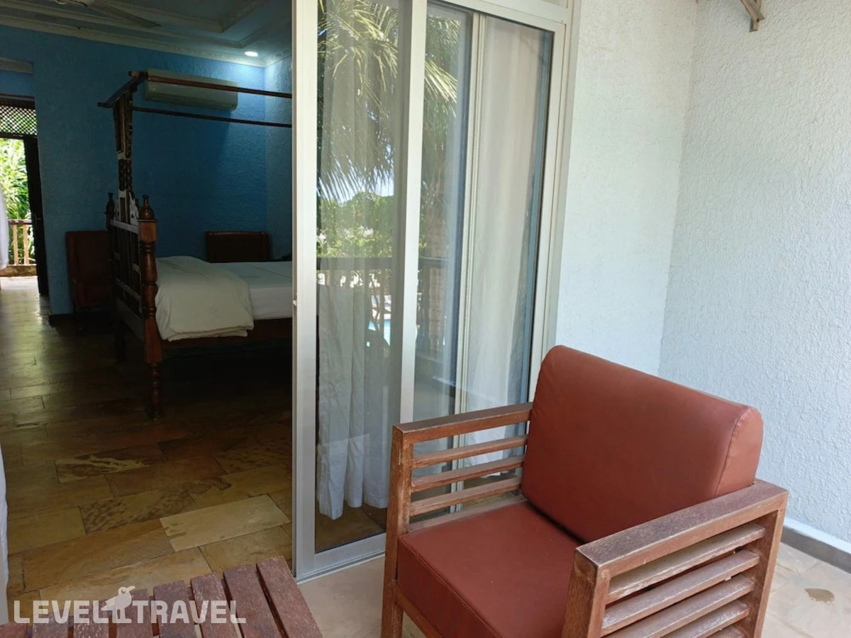 фотографии номера Стандартный с балконом и видом на море отеля Serene Beach Resort в Танзания(Дар-эс-Салам) - фото №9