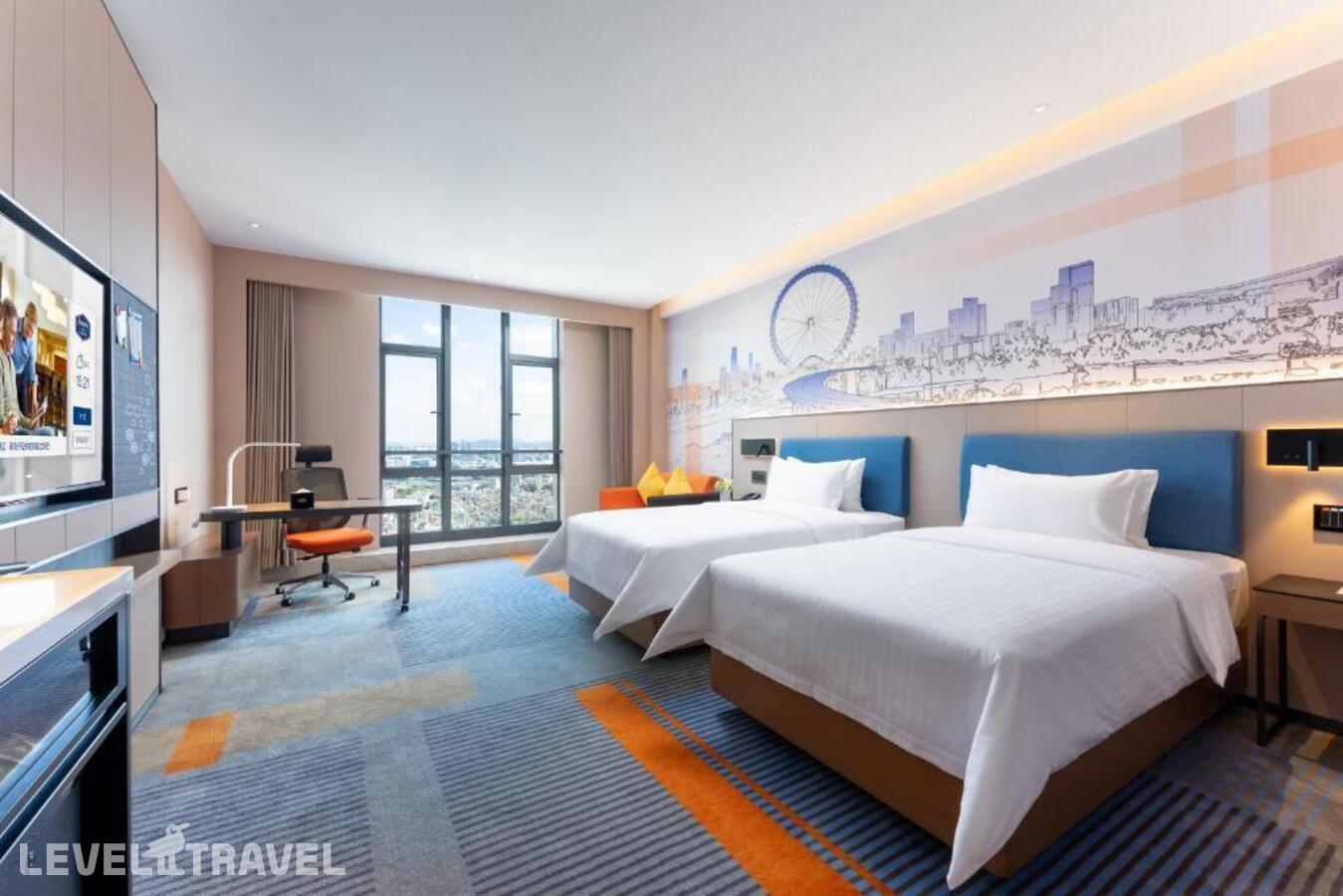 фотографии номера Делюкс (две односпальные кровати) отеля Hampton By Hilton Guangzhou Jinshazhou в Китай(Гуанчжоу) - фото №1