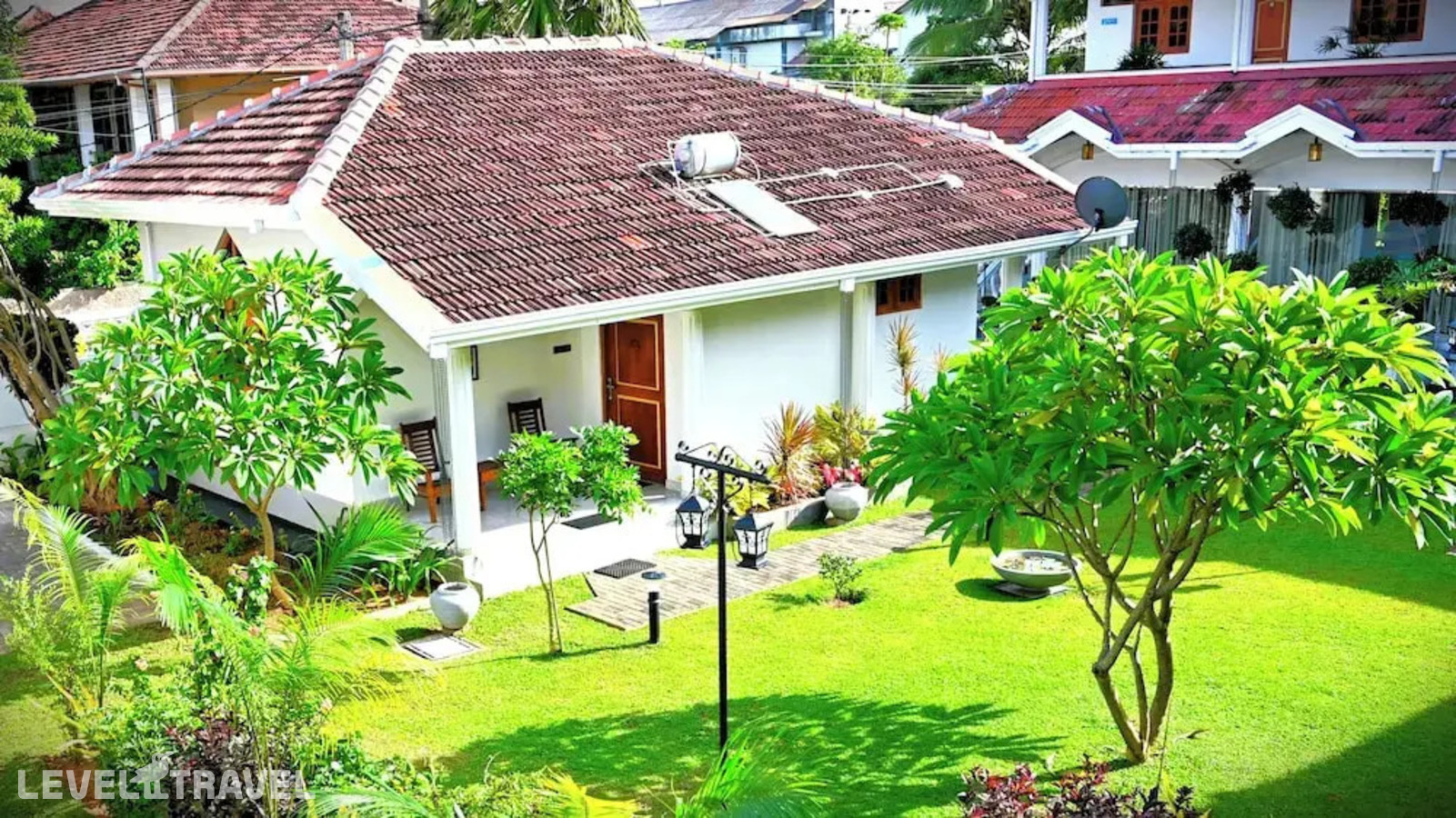 фотографии номера Люкс с видом на сад отеля Paradise Holiday Village в Шри-Ланка(Негомбо) - фото №5