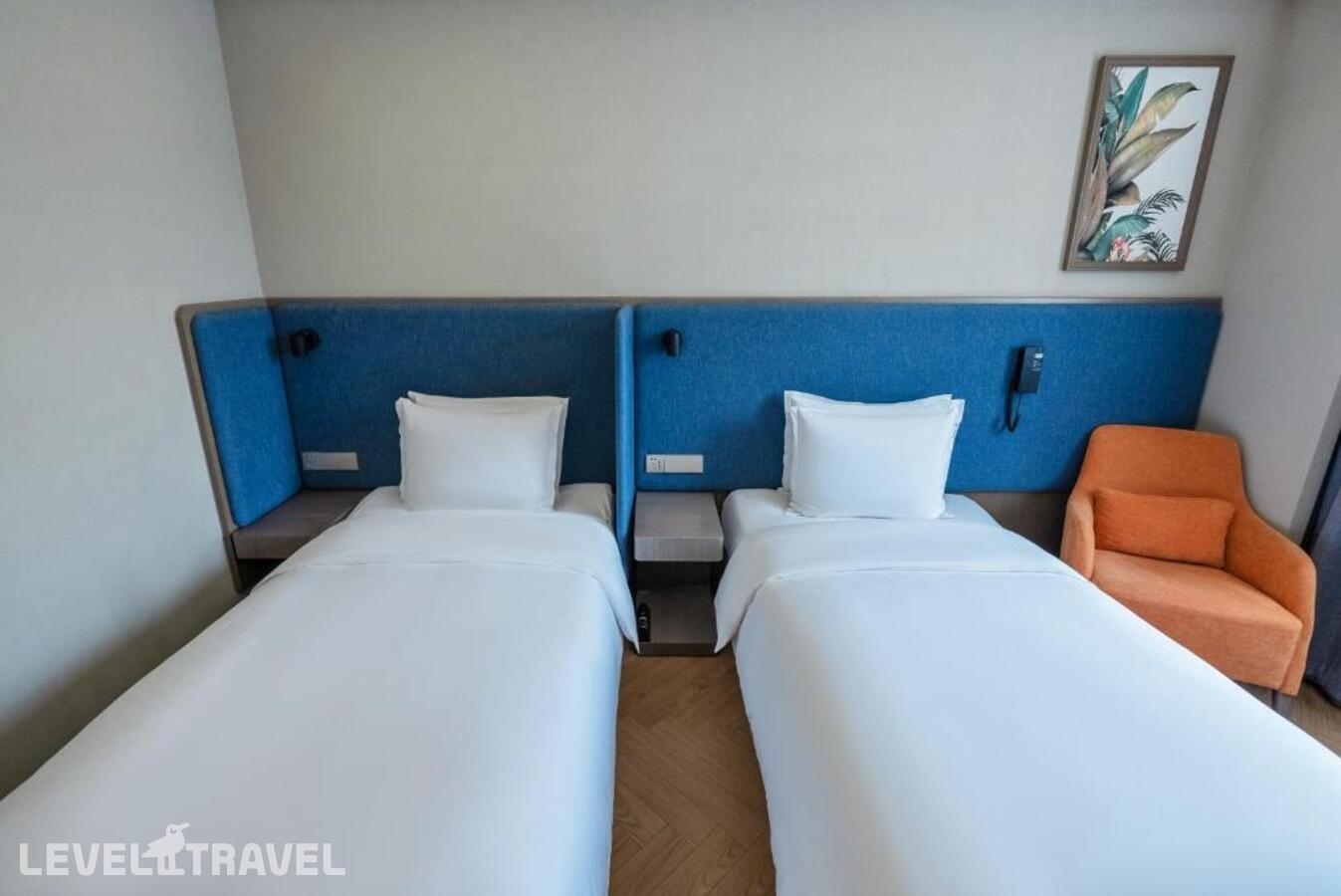 фотографии номера Стандартный (две односпальные кровати) отеля Holiday Inn Express Beijing Badaling, An Ihg Hotel в Китай(Пекин) - фото №4