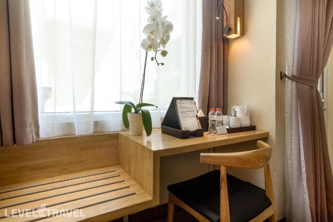 фотографии номера Делюкс с балконом (две односпальные кровати) отеля The One Legian Hotel в Индонезия(Кута) - фото №2