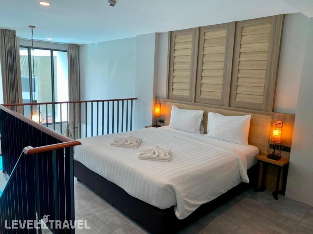 фотографии номера Люкс с видом на бассейн отеля Atom Phuket Hotel в Таиланд(Най Янг Бич) - фото №12