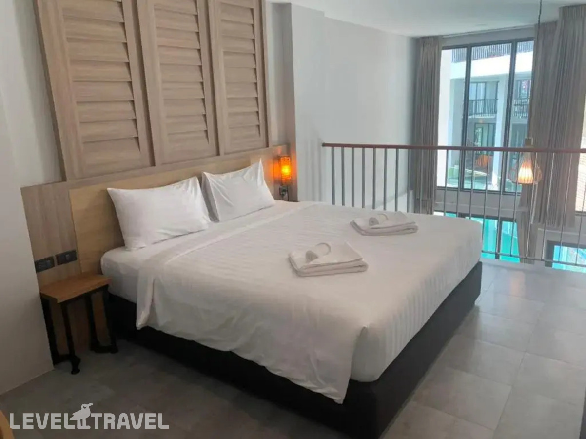 фотографии номера Люкс с видом на бассейн отеля Atom Phuket Hotel в Таиланд(Най Янг Бич) - фото №11