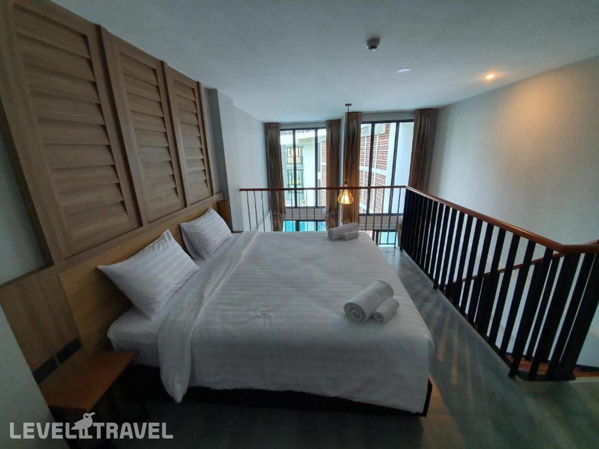 фотографии номера Люкс с видом на бассейн отеля Atom Phuket Hotel в Таиланд(Най Янг Бич) - фото №8