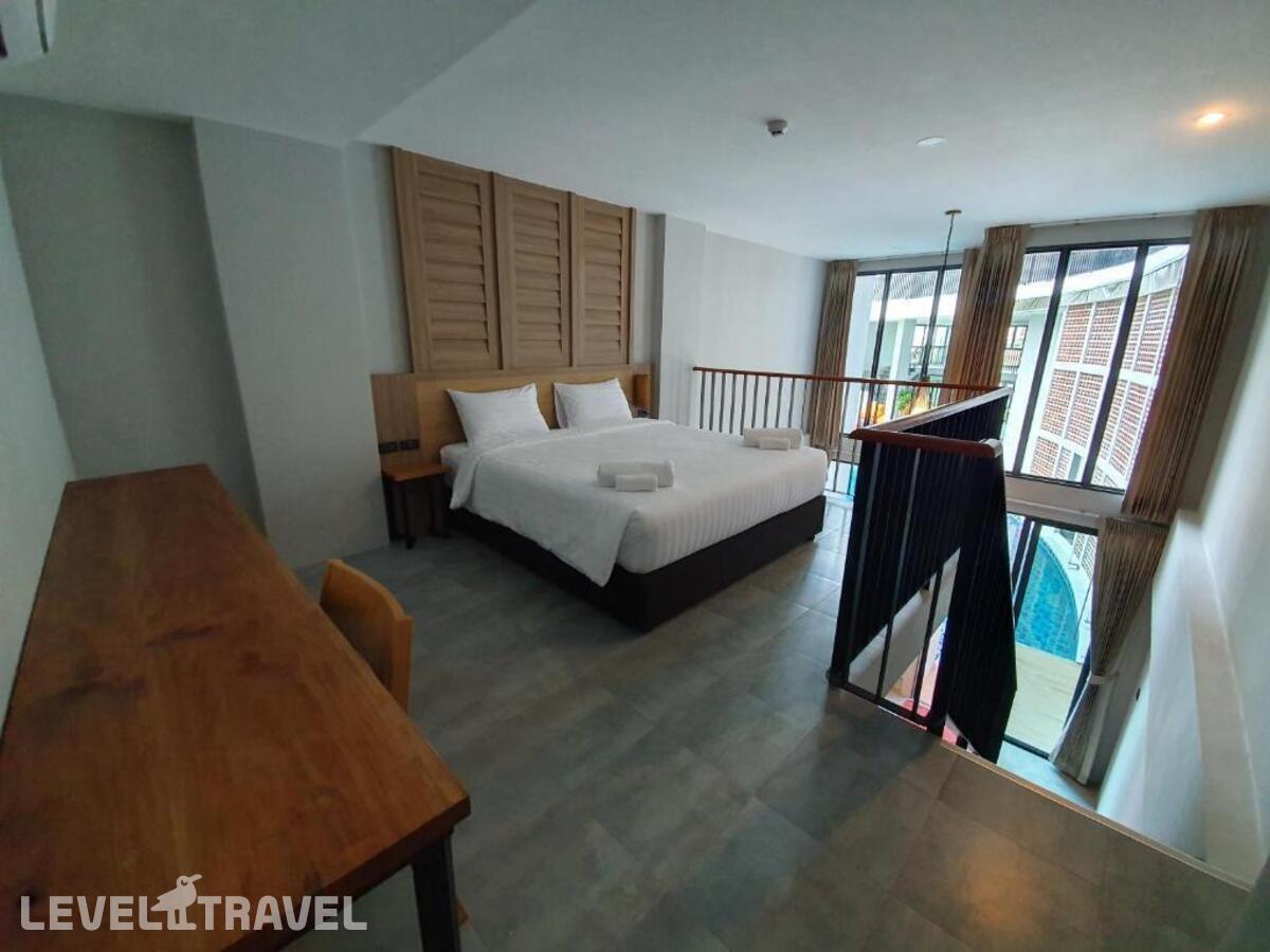 фотографии номера Люкс с видом на бассейн отеля Atom Phuket Hotel в Таиланд(Най Янг Бич) - фото №9