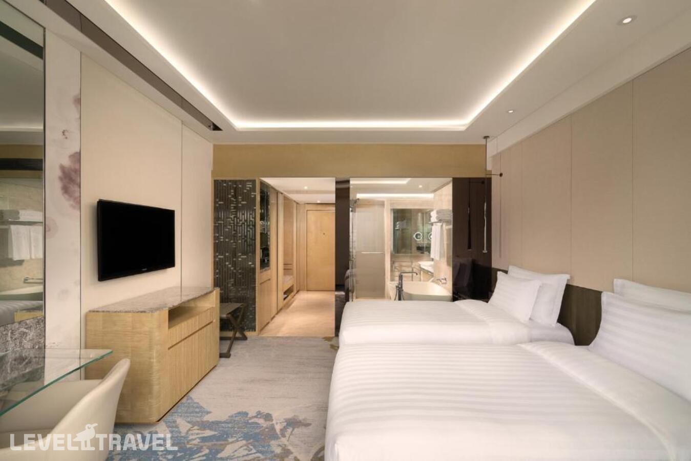фотографии номера Делюкс с видом на реку (две односпальные кровати) отеля Kempinski Hotel Beijing Yansha Center в Китай(Пекин) - фото №1