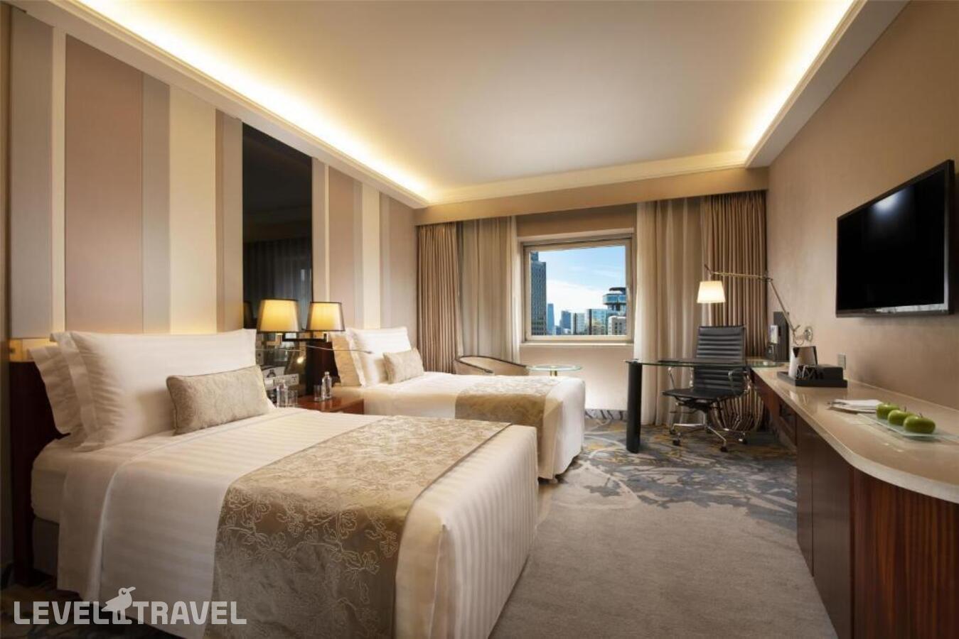 фотографии номера Стандартный (две односпальные кровати) отеля Kempinski Hotel Beijing Yansha Center в Китай(Пекин) - фото №1