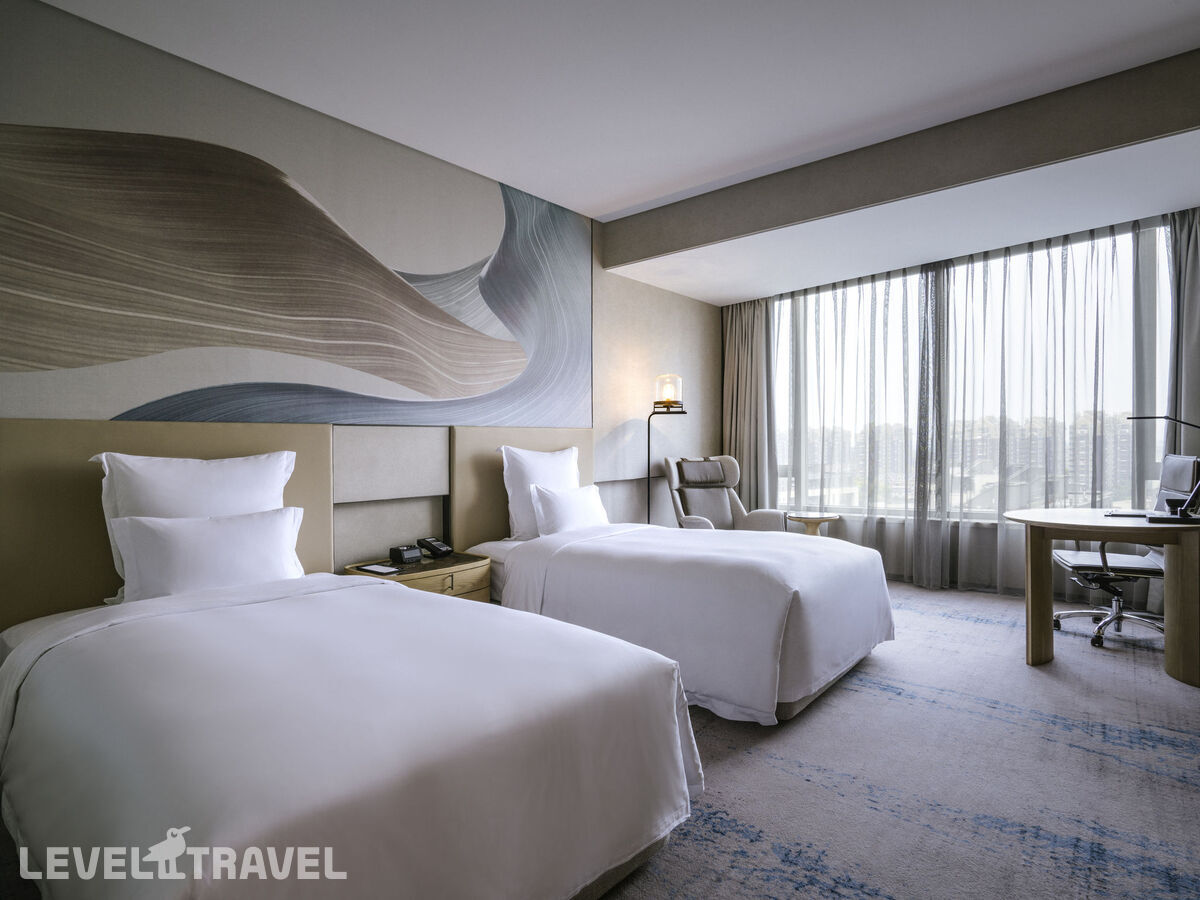 фотографии номера Делюкс (две односпальные кровати) отеля Pullman Shanghai Qingpu Excellence в Китай(Шанхай) - фото №1
