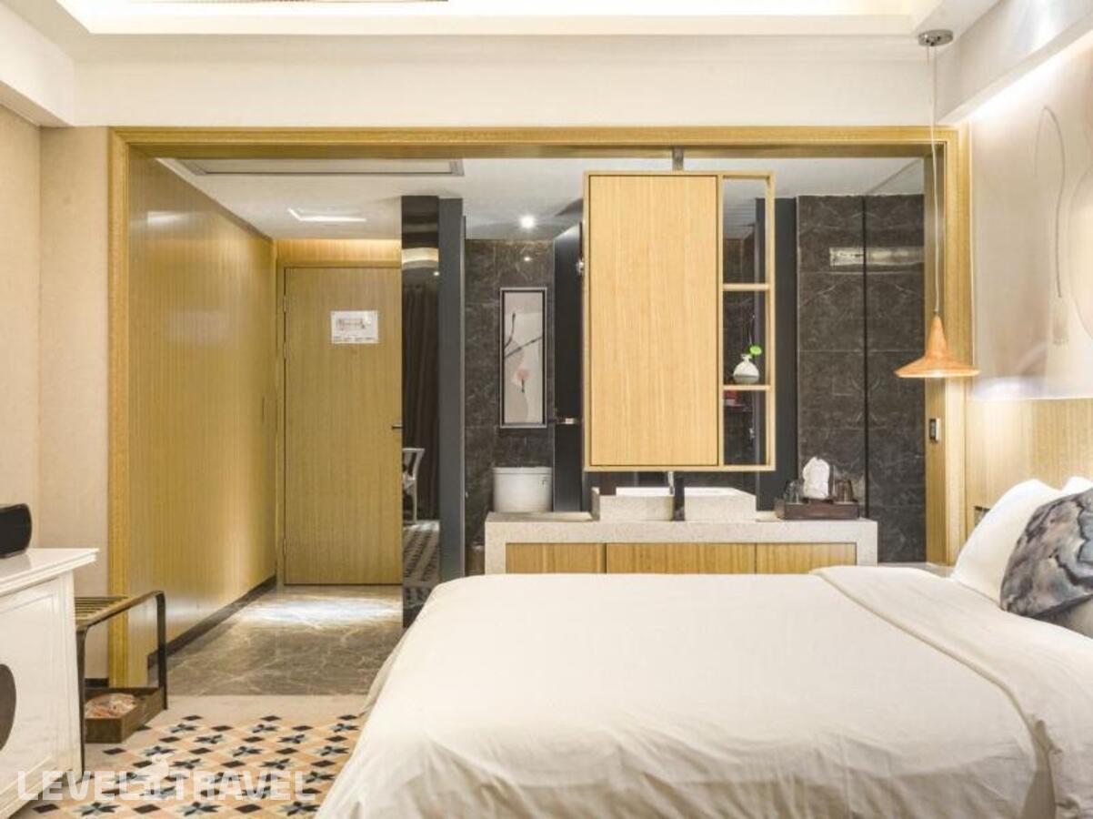фотографии номера Номер Роскошный отеля Paco Hotel - Guangzhou Tianpingjia Metro Branch в Китай(Гуанчжоу) - фото №2