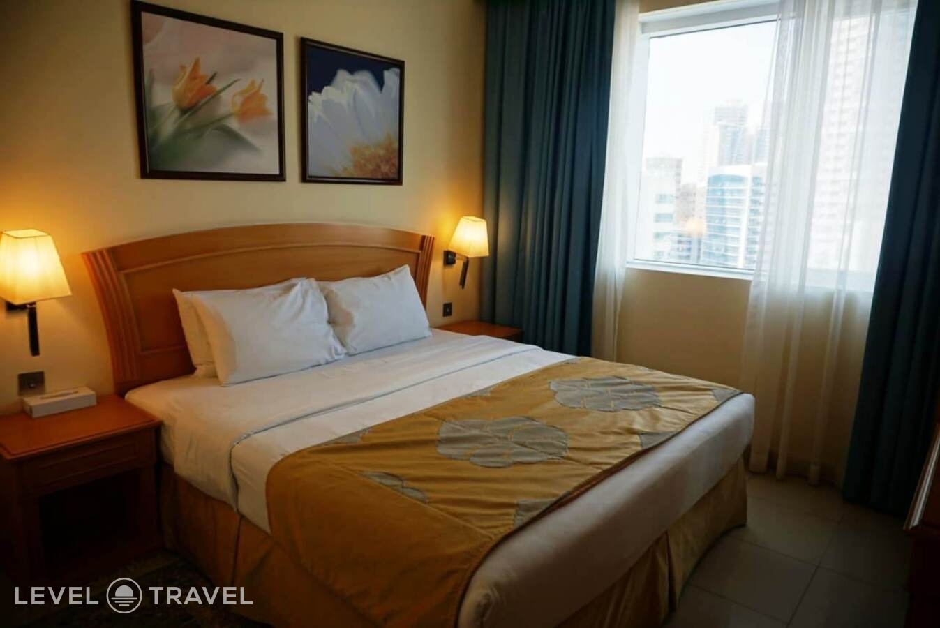 фотографии номера Номер (2 спальни) отеля Golden Tulip Sharjah в ОАЭ(Шарджа) - фото №1