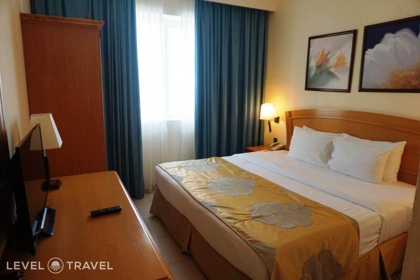 фотографии номера Номер (2 спальни) отеля Golden Tulip Sharjah в ОАЭ(Шарджа) - фото №4