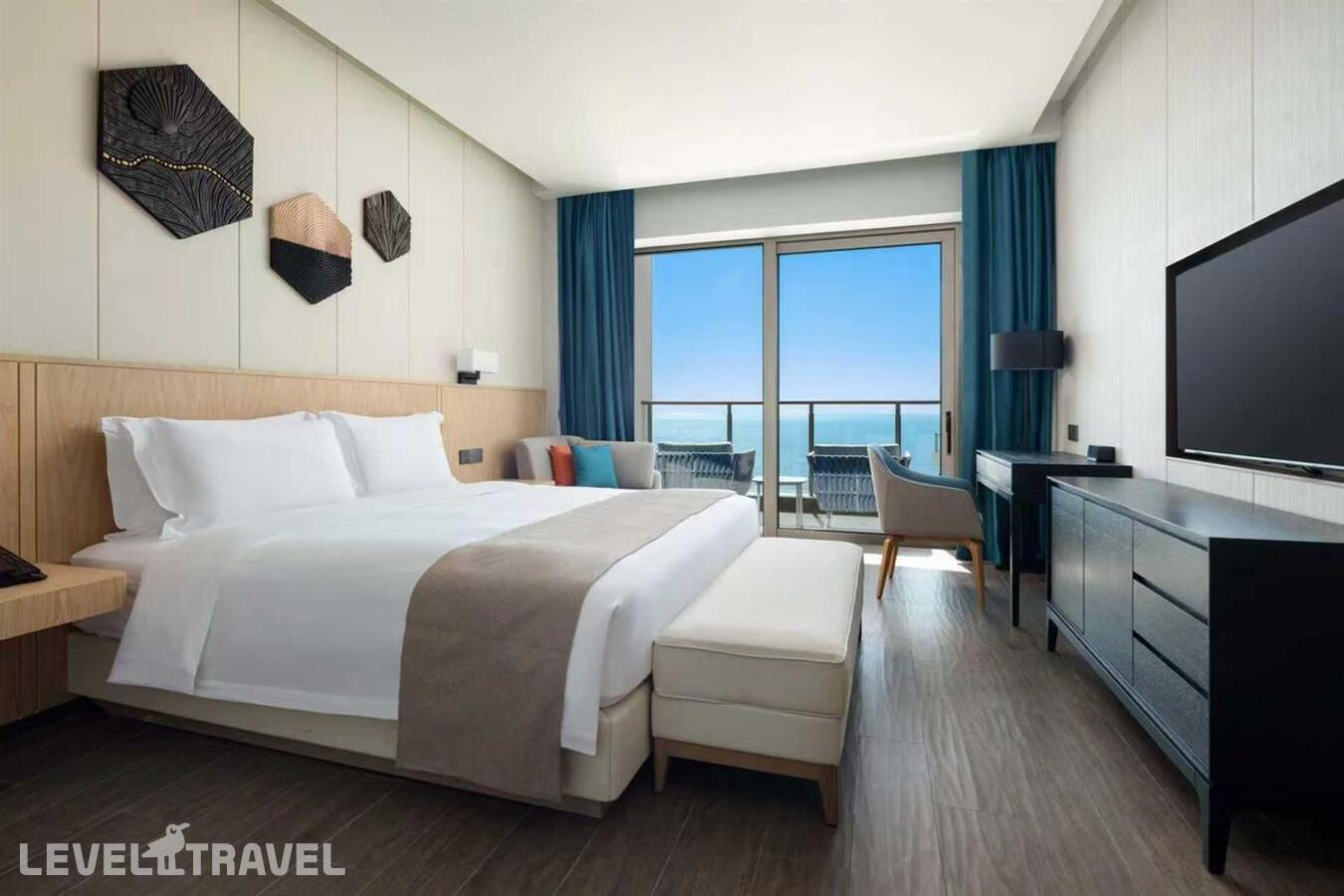фотографии номера Люкс с террасой и видом на океан отеля Sanya Junji Seaview Hotel в Китай(Санья) - фото №1