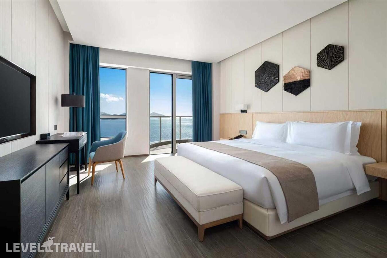 фотографии номера Люкс с панорамным видом на океан отеля Sanya Junji Seaview Hotel в Китай(Санья) - фото №1